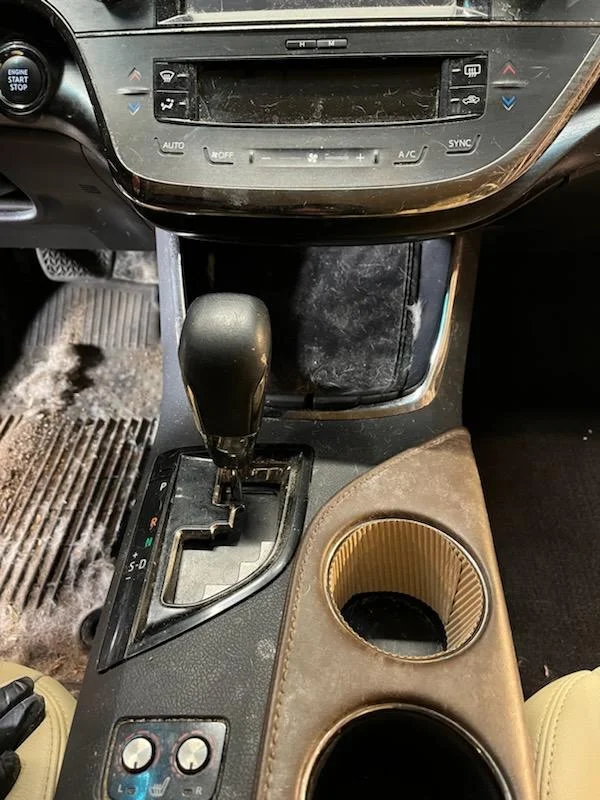 Center console before deep cleaning